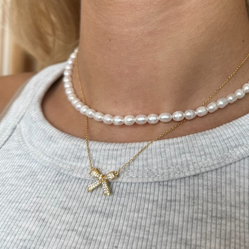 Elvira halskæde i 18 karat forgyldt sølv med sløjfe fra MerlePerle