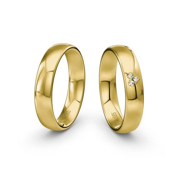 Romantiske Siersbøl vielsesringe i 9 eller 14 karat guld med hjerteformede diamanter 0,021 ct og blank overflade.