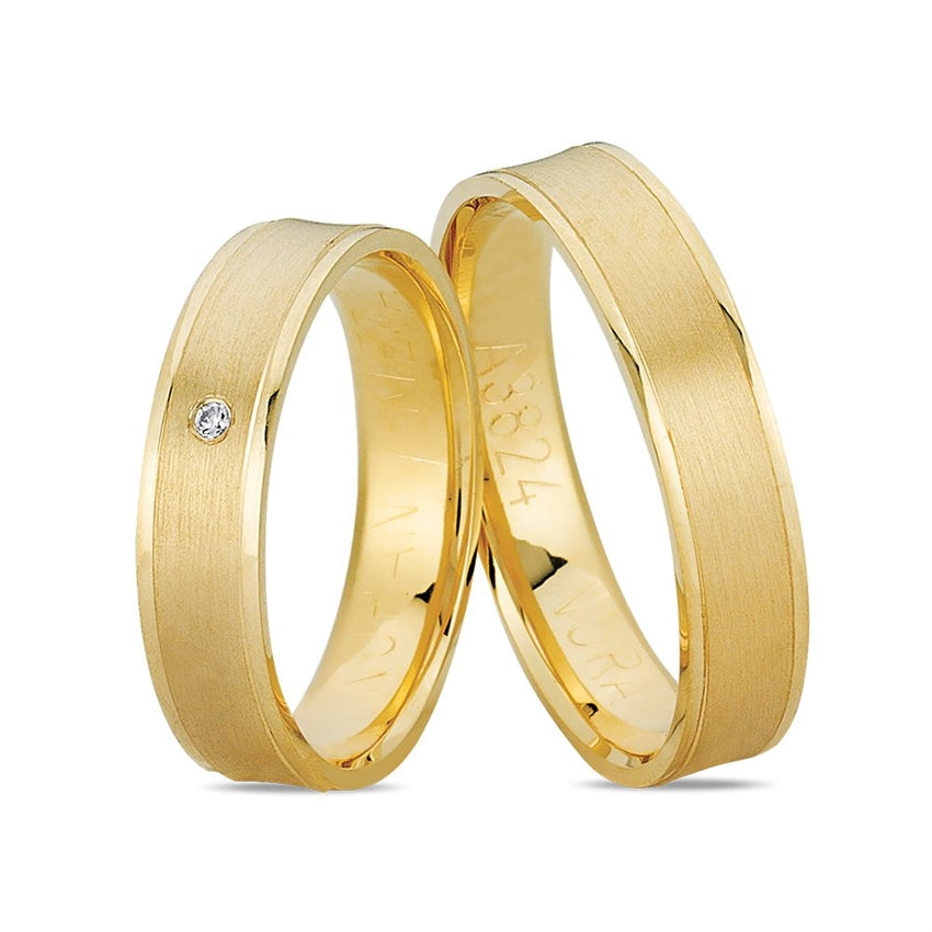 Nuran vielsesringe i 8 eller 14 karat guld med diamant