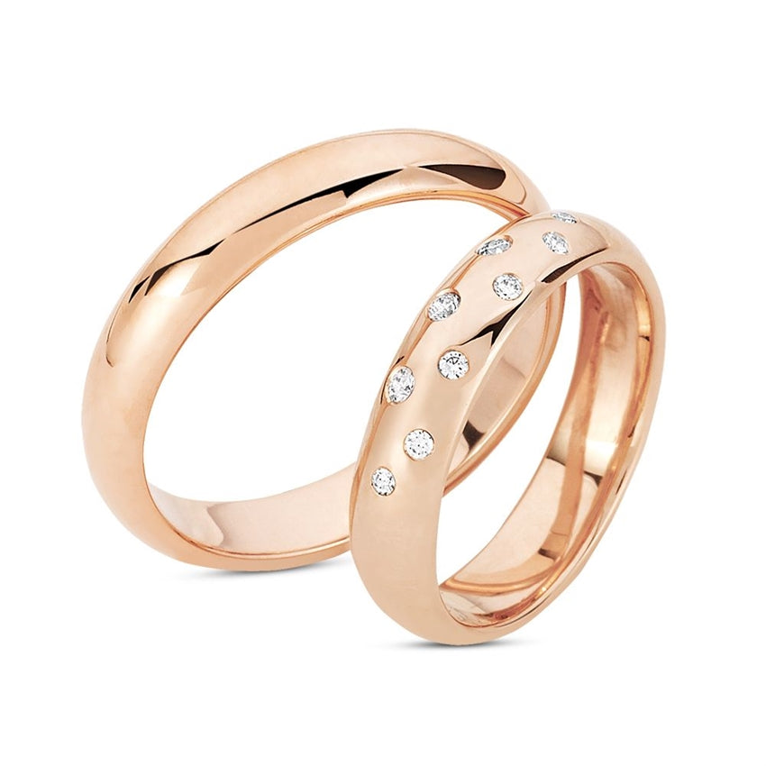 Tidløs Nuran vielsesringe i 14 karat rosa guld med 9 diamanter og blank finish fra Smykkecenter.