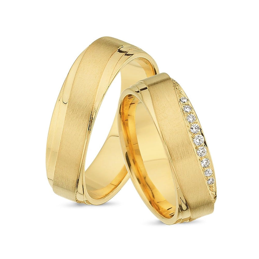 Nuran vielsesringe i 8 eller 14 karat guld med 0,12 ct diamanter