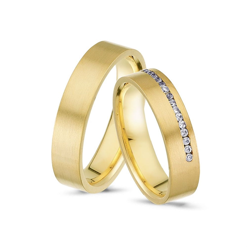 Smukke Nuran vielsesringe i 14 karat guld med 0,16 ct diamanter