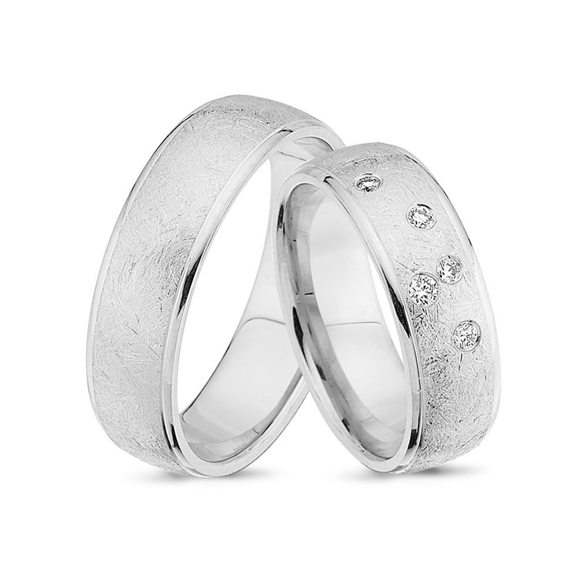 Unikke Nuran vielsesringe i 14 karat hvidguld med 0,10 ct diamanter