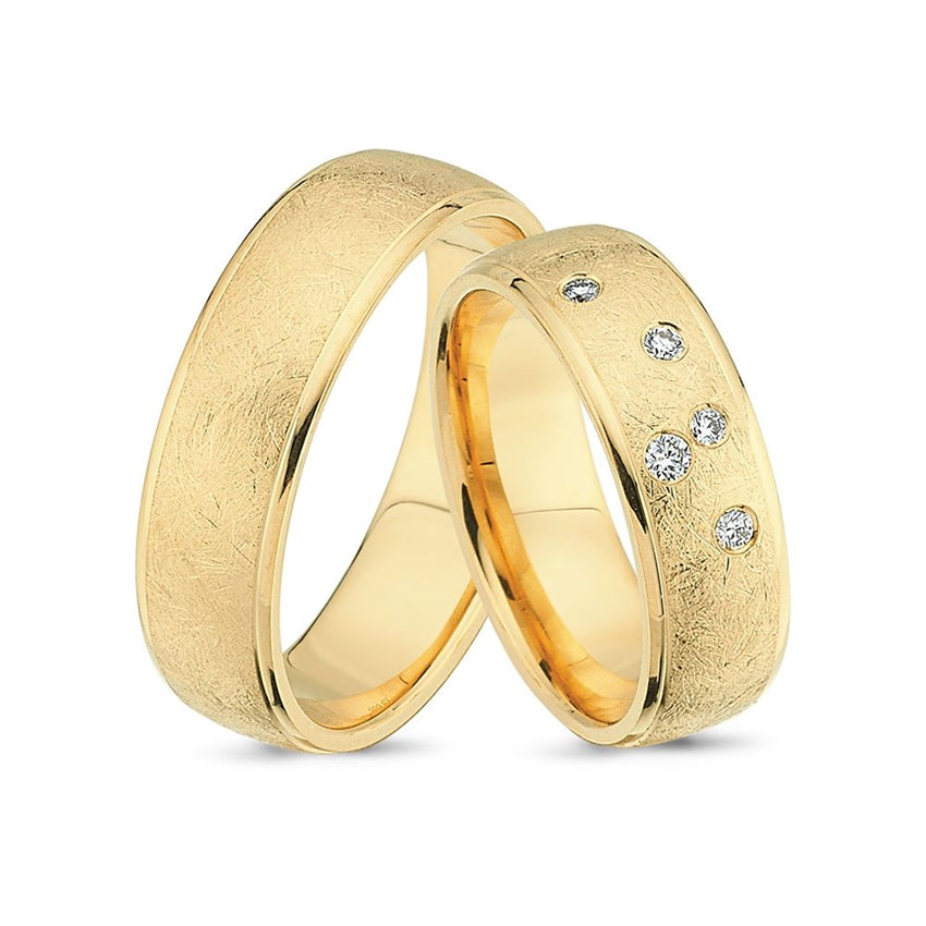 Nuran vielsesringe i 8 eller 14 karat guld med 0,10 ct diamanter