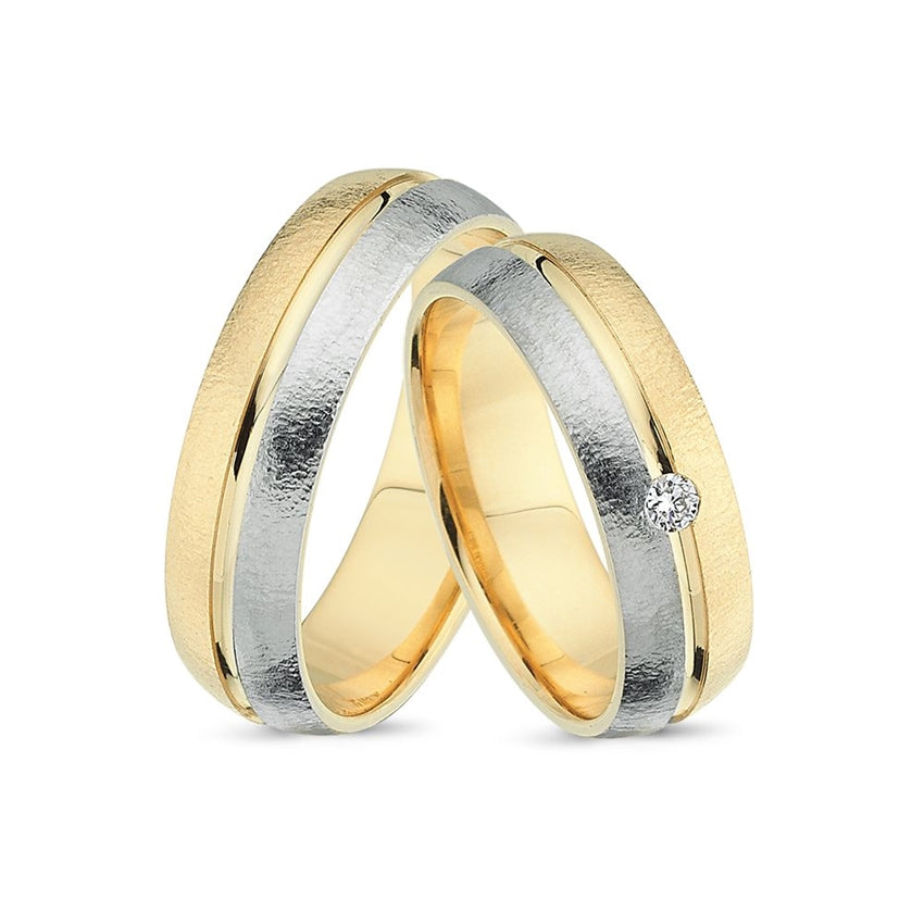 Unikke Nuran vielsesringe i 14 kt guld og hvidguld med 0,28 ct diamant