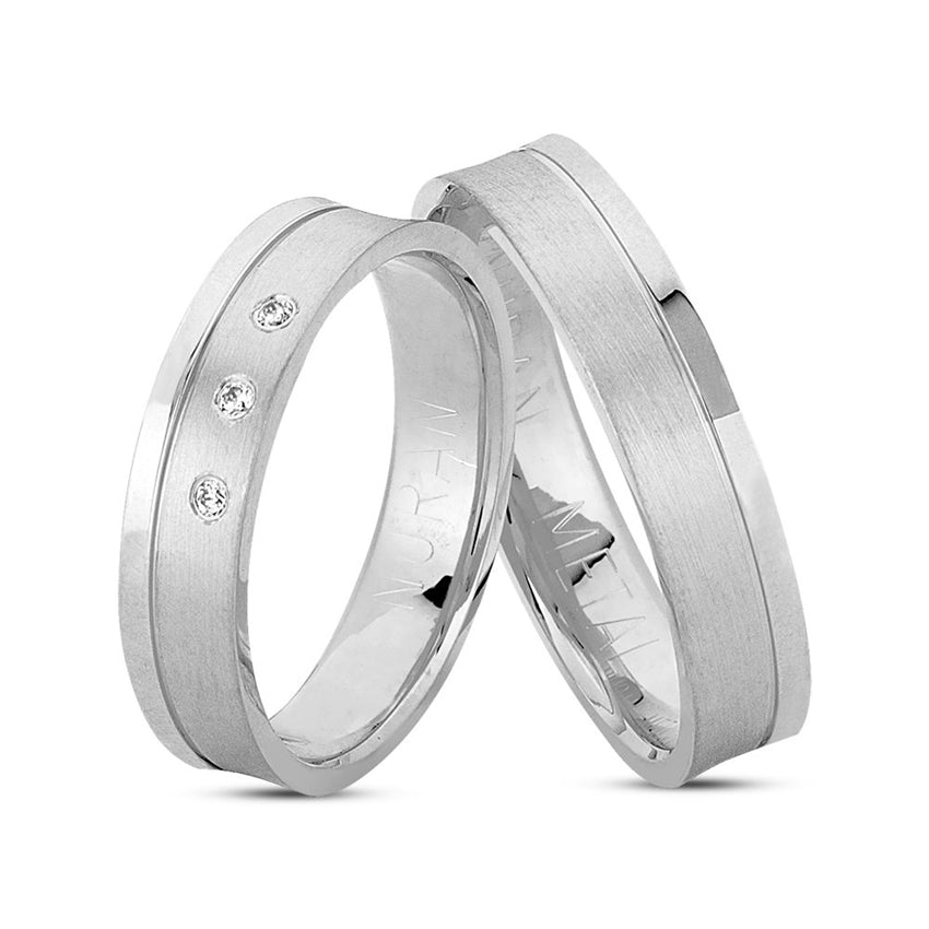 Unikke Nuran vielsesringe i 14 kt hvidguld med 3 diamanter og kombineret blank og silkemat overflade.