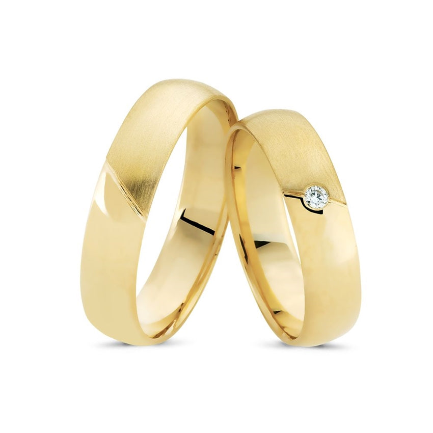 Tidløse Nuran vielsesringe i 14 kt guld med 0,03 ct diamant