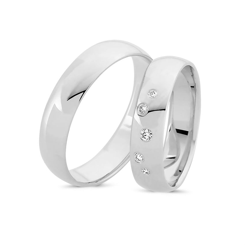 Smukke Nuran vielsesringe i 14 kt hvidguld med 5 diamanter i Wesselton/VS kvalitetsdiamant.